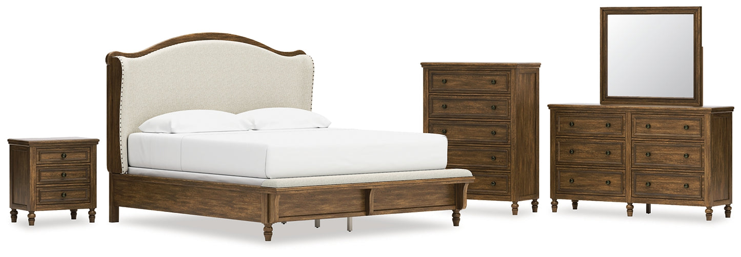 Sturlayne King Upholstered Panel Bed, Dresser, Mirror, Chest and Nightstand