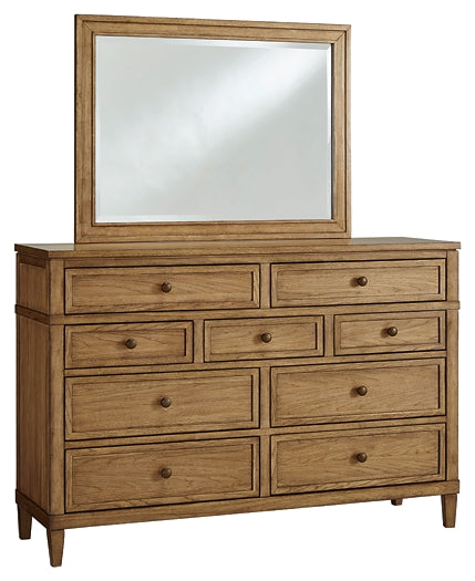 Sharlance Queen Upholstered Panel Bed with Mirrored Dresser